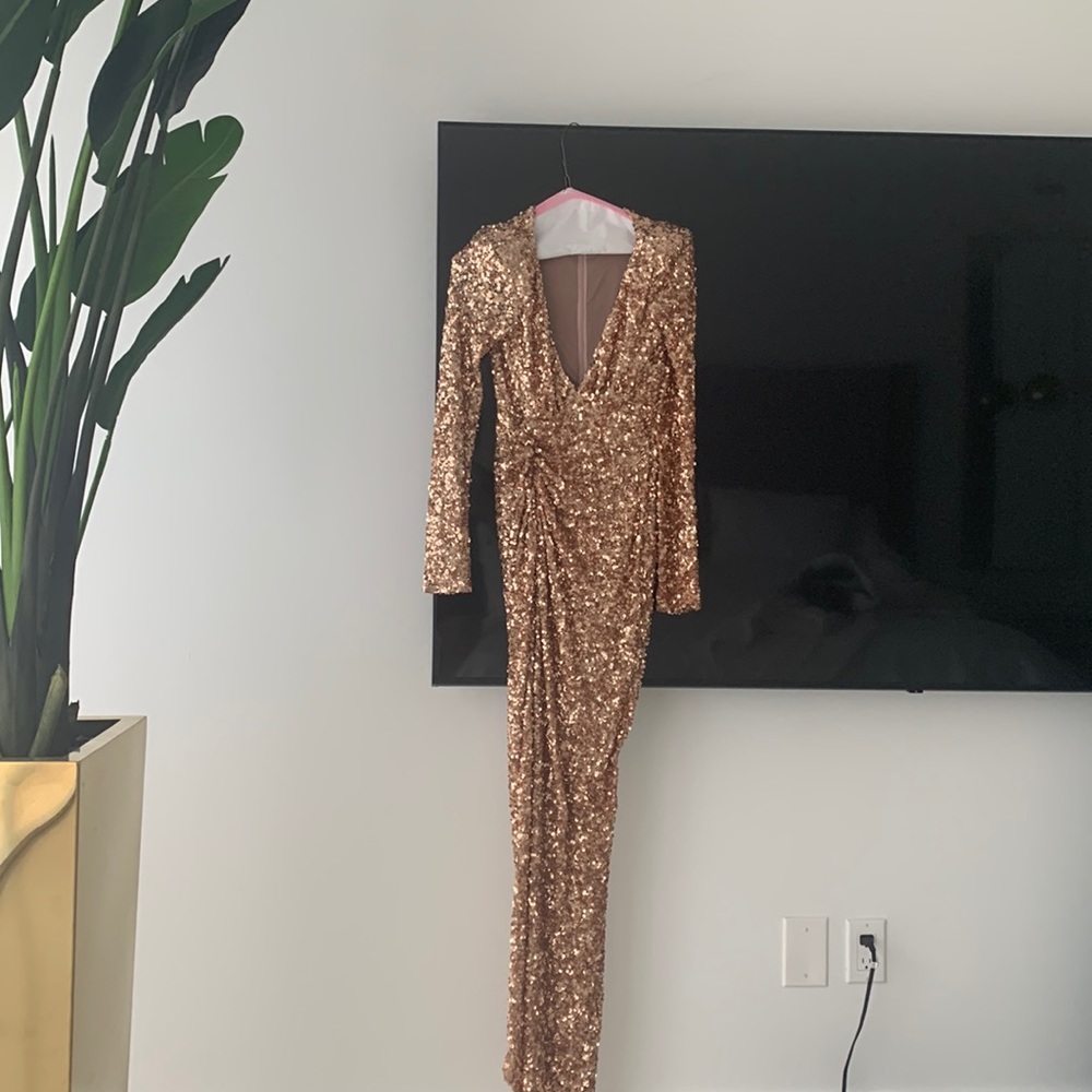 This dress is from the brand Abyss by Abby. It is a very pretty dress!